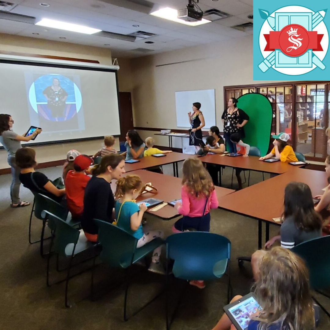 Kids play with iPads in library to create their comic Kids play with iPads in library to create their comic