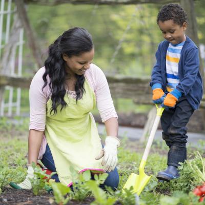 mom-son-gardening.jpg A mother and her young son work together in a garden