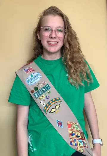 Libby in uniform.jpg Libby Scanlon in her Girl Scout Sash