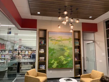 glass walled reading room with art installation glass walled reading room with art installation