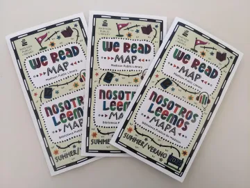 Three WE READ maps created by Madison Public Library laid out on a white background